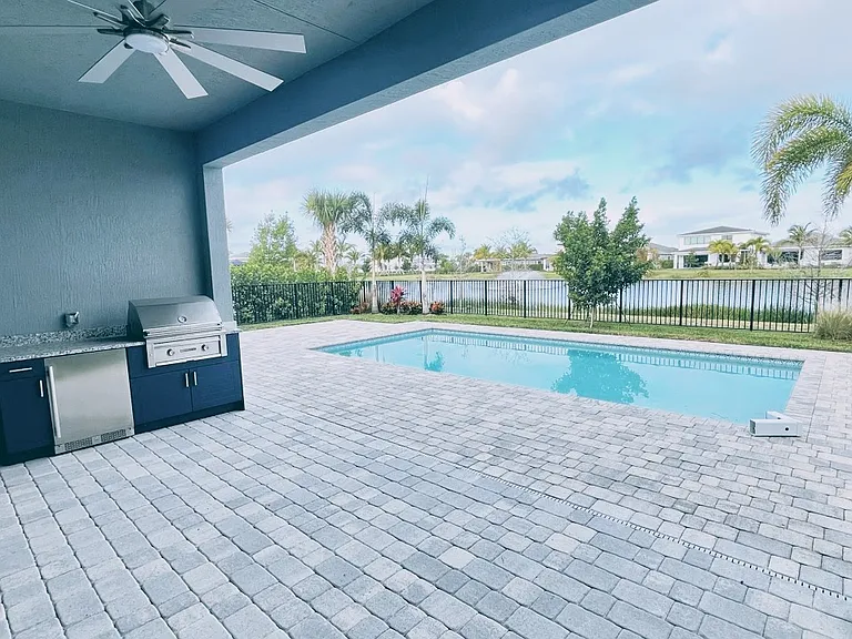 Builtin outdoor barbecue and in-ground heated pool