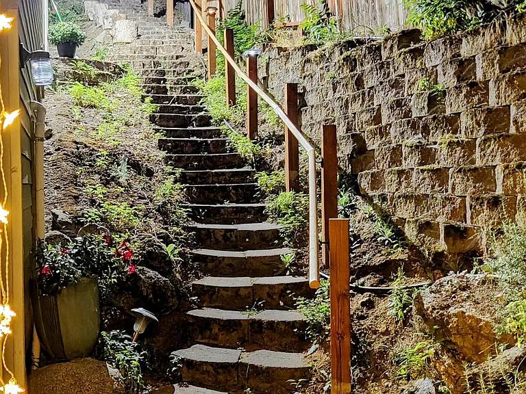 Shallow steps from street to private entrance.