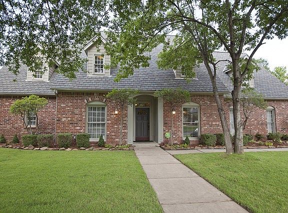 Updated full-brick home on treed lot.