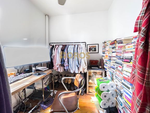 5th image of 215 E 10th St APT 21