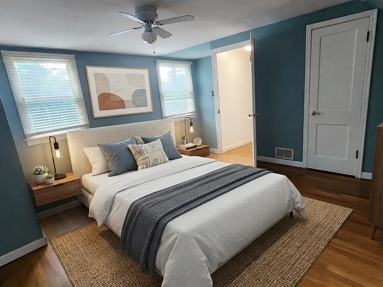 Primary bedroom with 2 separate closets.