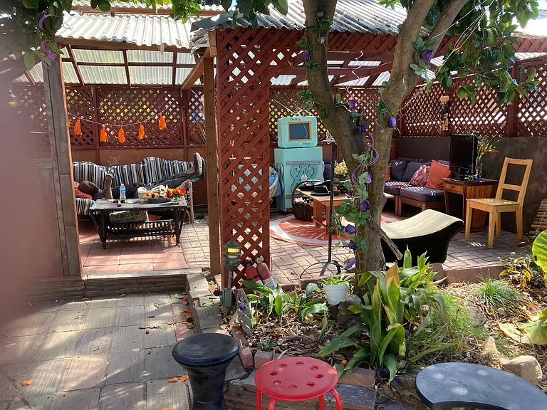 Outdoor structure-semi closed-in Great for summer sleeping.