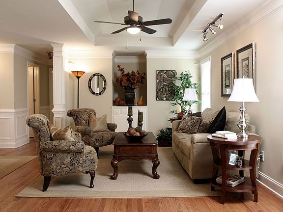 Family room with trey ceiling and entertainment nook