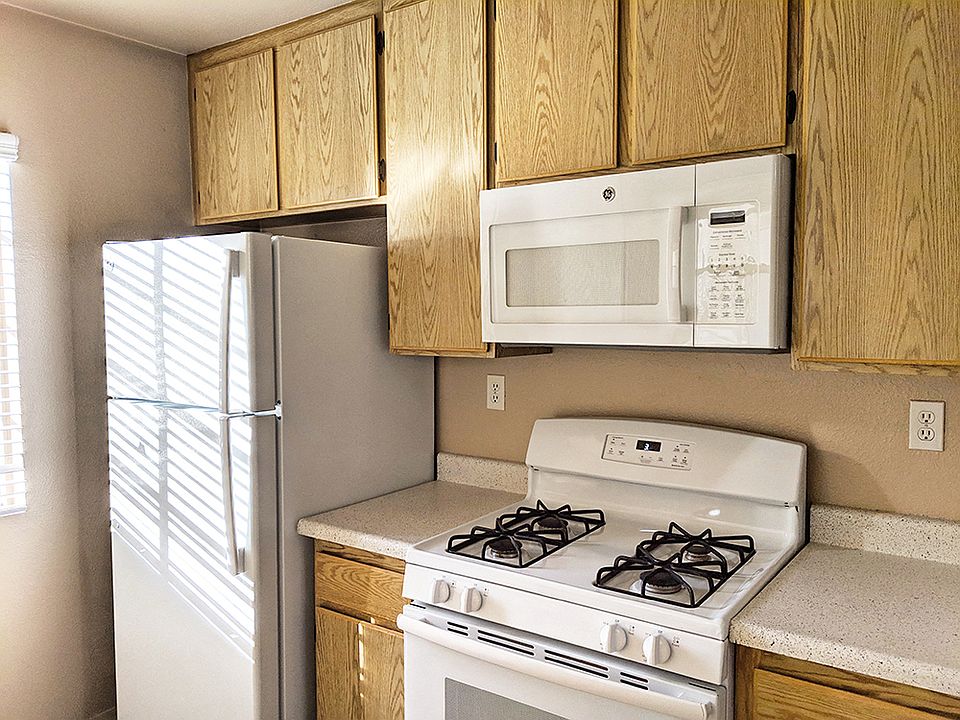White GE appliances in kitchens