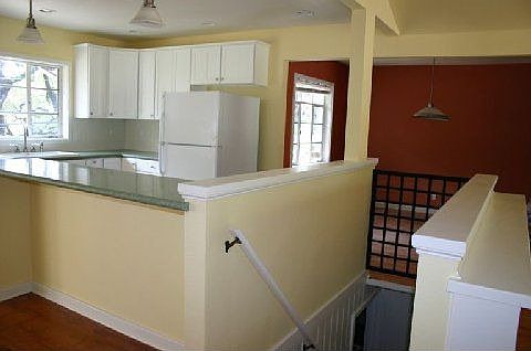 kitchen and stairwell to lower level