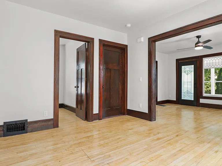 DIning room looking into living area to the right and first bedroom to the left. Washer Dryer behind that doo!! YEAH!!