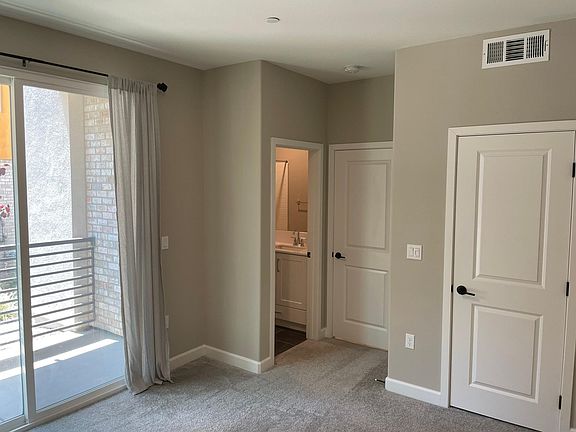 1st Level Bedroom with Private Bathroom and Patio Access