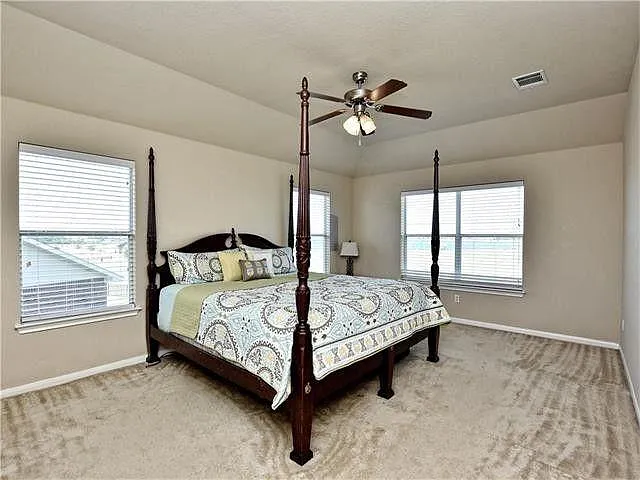 All bedrooms unstairs. This is the master. Back wall faces the lake.