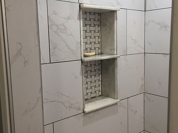 Downstairs shower tilework