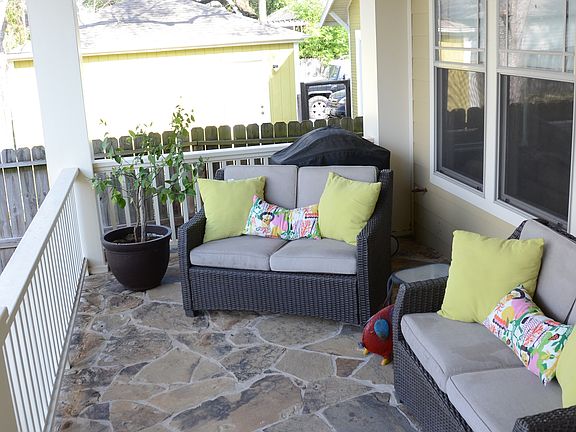 Back porch overlooks pool
