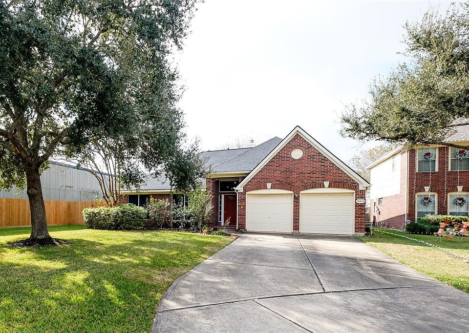 Beautiful home on a cul-de-sac street in a neighborhood with many well-aged trees.