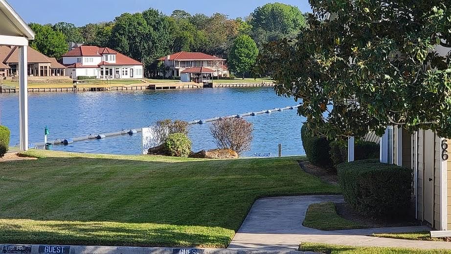 Your view of Lake Conroe, beside a boardwalk that you have the freedom to enjoy.