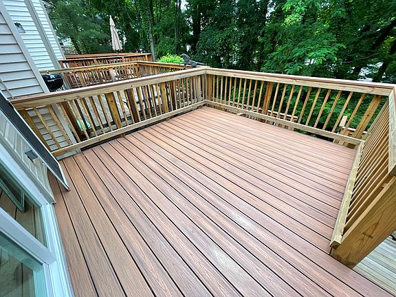 Trex upper rear deck facing wooded area.