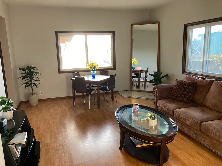 Shared living room and breakfast nook, high ceilings, freshly painted, fully furnished.
