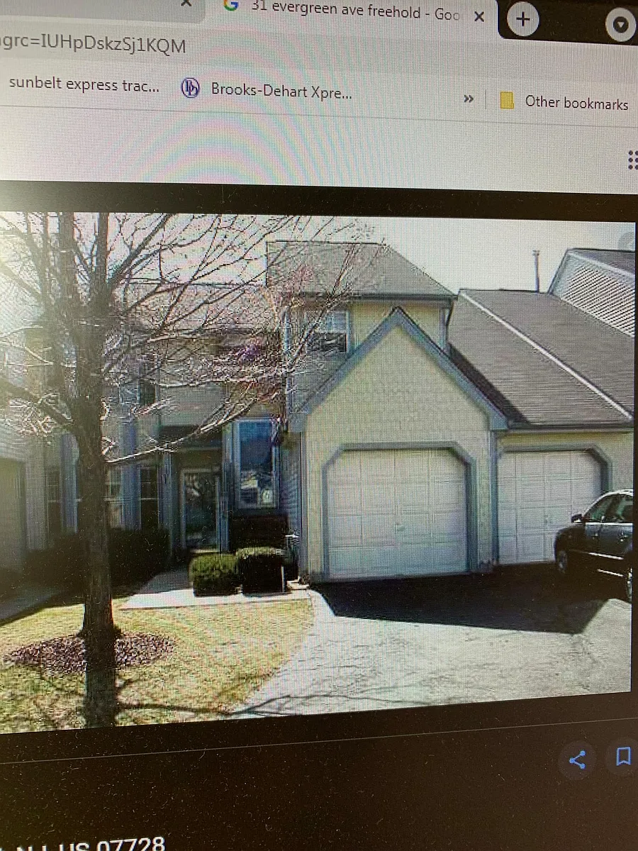 Photo 2 of 19 - 31 Evergreen Ct - Freehold, NJ right garage enters into unit - 31 Evergreen Ct