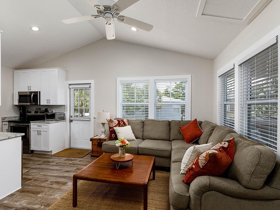 living room with vaulted ceiling