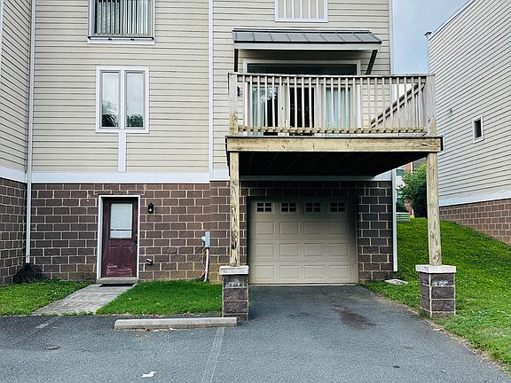 Rear/Garage Entrance and 2-private Parking Spots