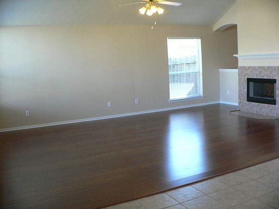 Another view of family room from kitchen. Note the nice long wall - perfect for all of your entertai