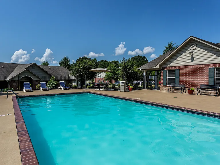 Relax and unwind at this tranquil poolside oasis, perfect for sunny afternoons.