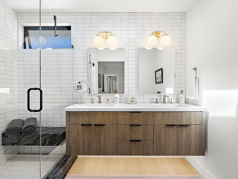 Master Bathroom- features dual sink vanity and walk in shower