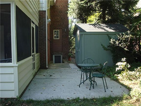 Rear Patio , Shed, and Basement Entrance