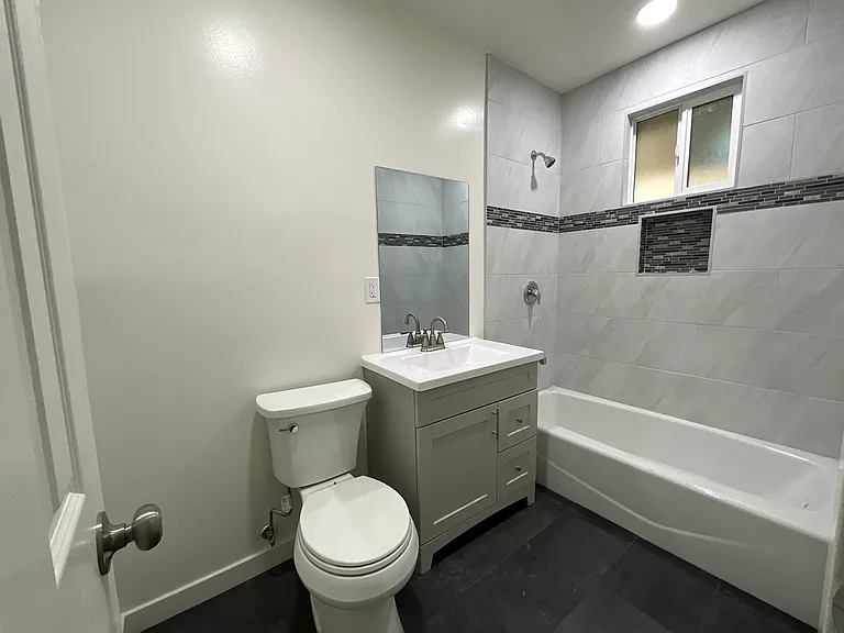 Hallway, bathroom new tub new sinks