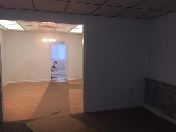 looking into dining room from living room. the brown runner is just temporary for walking on to keep the floors clean.