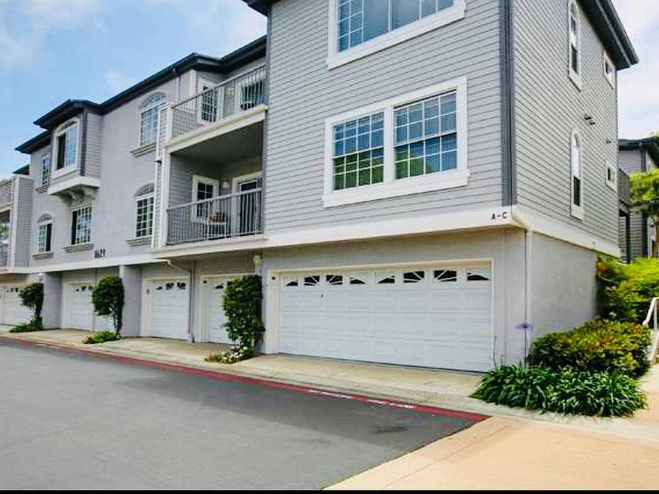 Each building has only 6 units--two townhouses on the back half (two-stories) and four single-story condos on the front. Two-car garages are assigned to townhouses (detached) and they have an additional, large storage room inside w/ locked door.