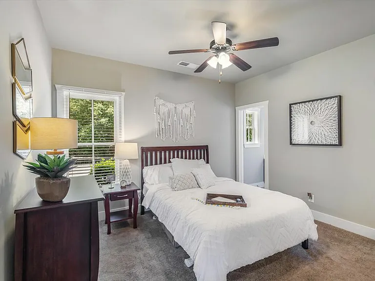 Relax in spacious, comfy bedrooms at The Cottages of Hattiesburg.