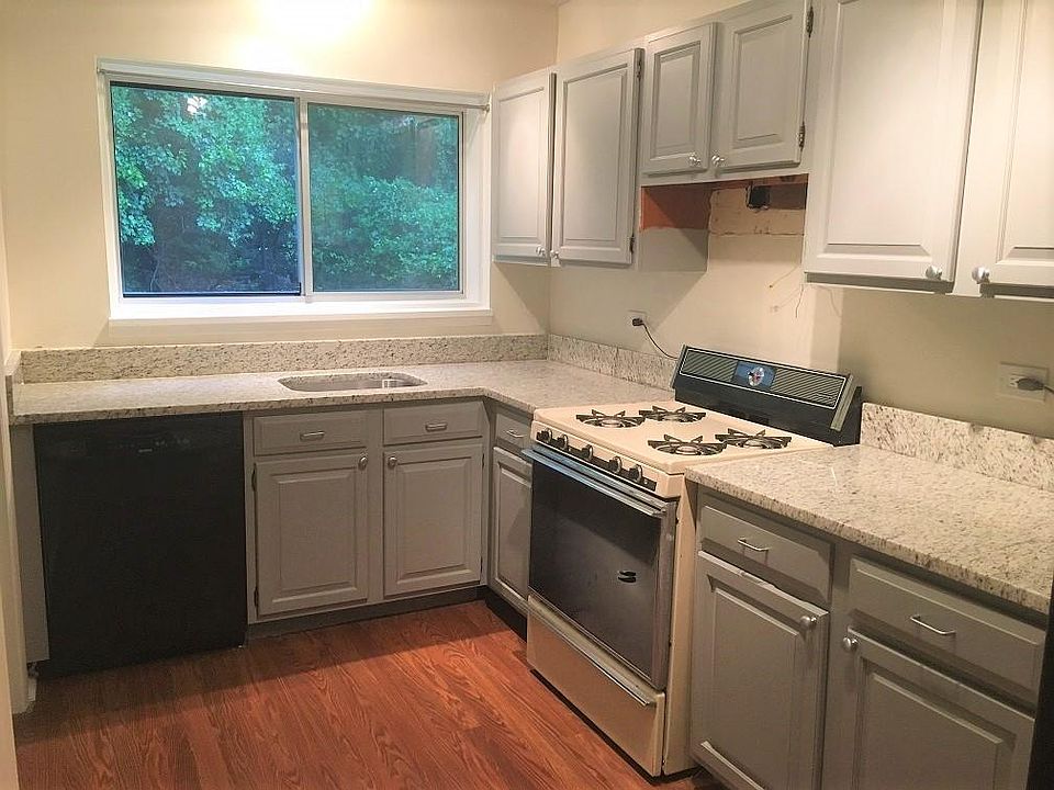 Granite countertops, (new stainless range hood and faucets n