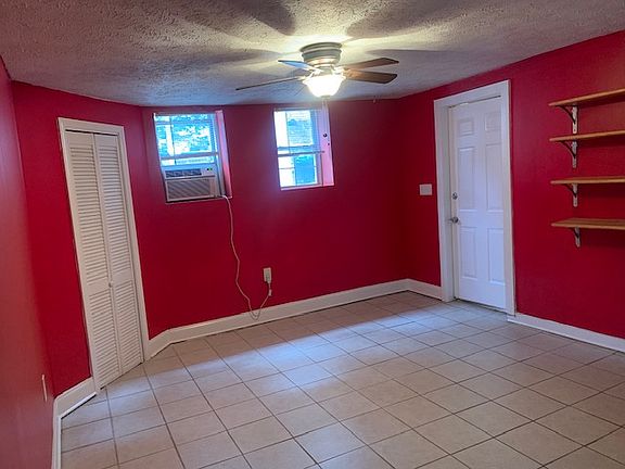 Bedroom unfurnished (note the walls are now a light grey)