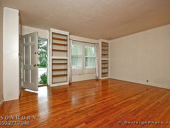 Front living room with built in bookcases