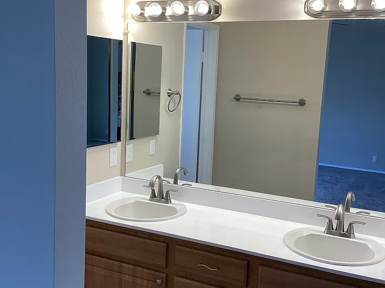 Master bedroom en suite with double sinks
