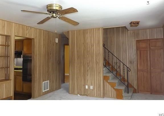 Entry to Living Room,, newly carpeted flooring.