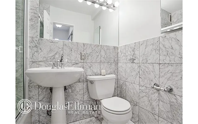 Sold by Douglas Elliman | media 13