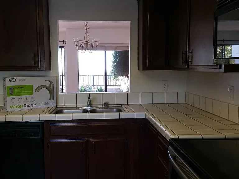 Kitchen looks to view deck