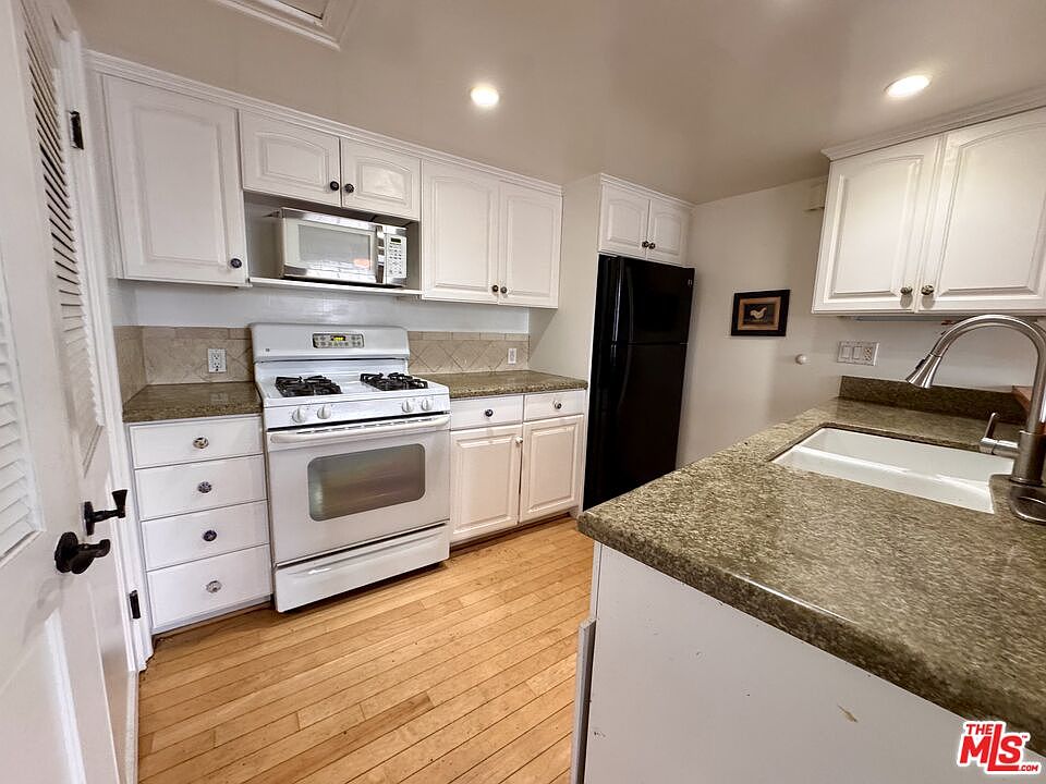 1st image of 7025 Glade Ave Unit 5