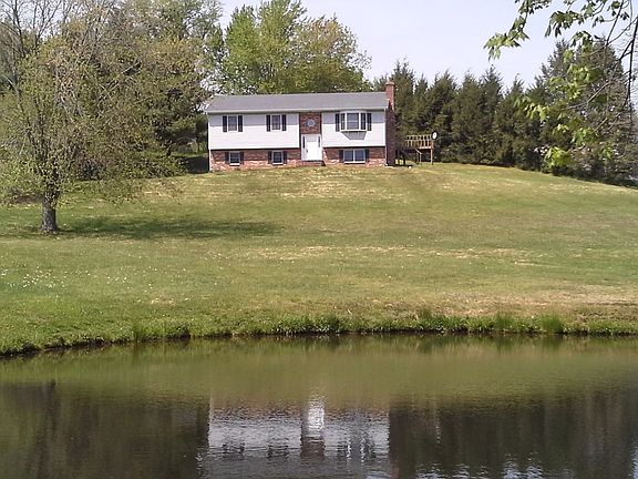 HOME AND POND 2.3 ACRES