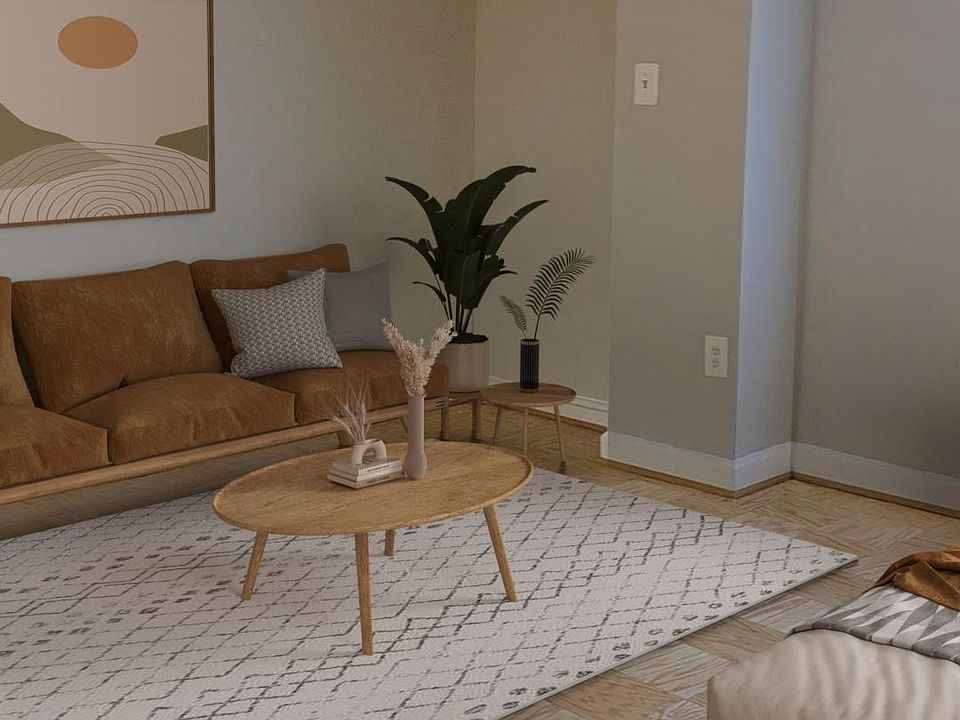 Studio living area (virtually staged)