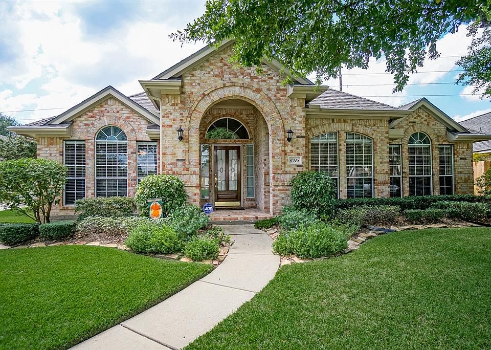 This is what you have been looking for! 1 story home with 3 car garage and park like backyard