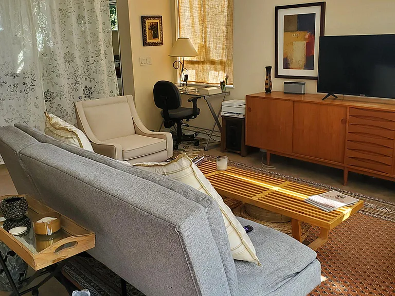 The t.v., sofa and coffee table are no longer offered