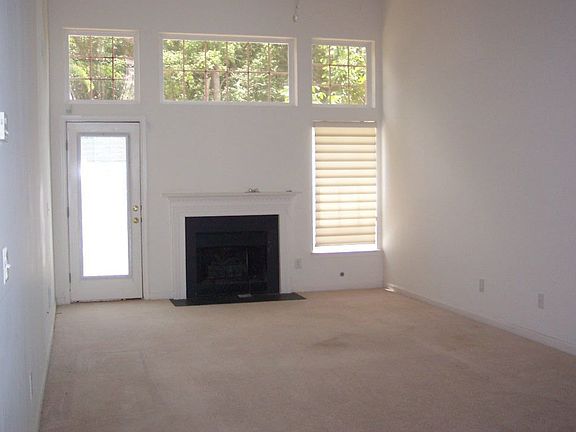 2 storey Greatroom w/ lots of windows.