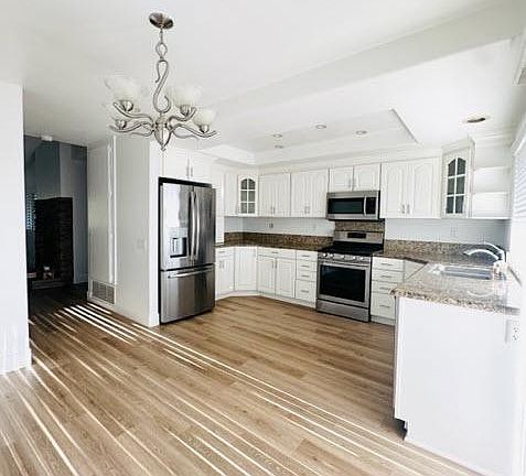 Features: Granite Counters, Remodeled Kitchen, Self-closing cabinet doors, Self-closing drawers, all appliances included