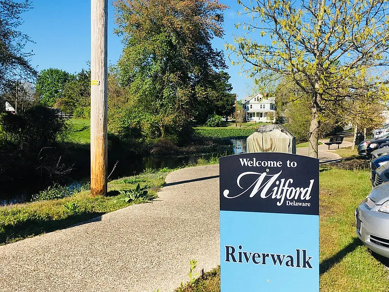 Steps to the Riverwalk path that leads through downtown shops, restaurants, farmers market, and library.