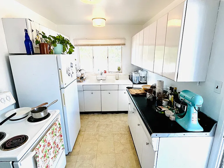 Super cute kitchen, lots of cabinet space!