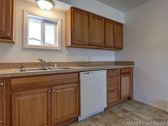 Wood cabinets and soft step floors