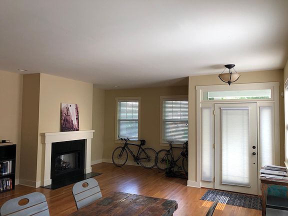 One of two living rooms with fireplace