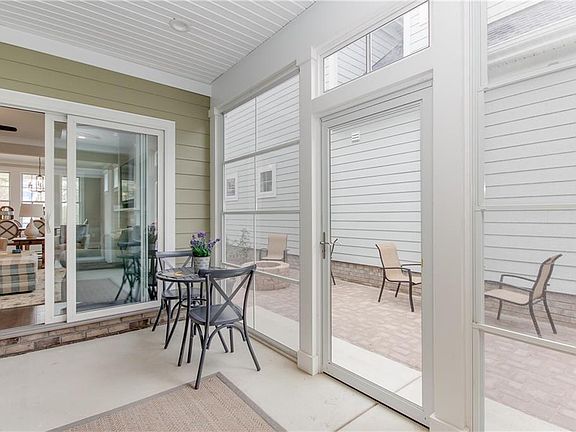 Covered porch leading to outside court yard is included screening is at additional cost