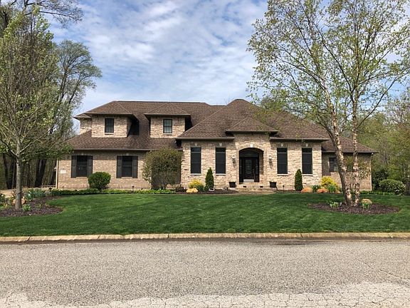 90% Stone, 10% brick and cedar