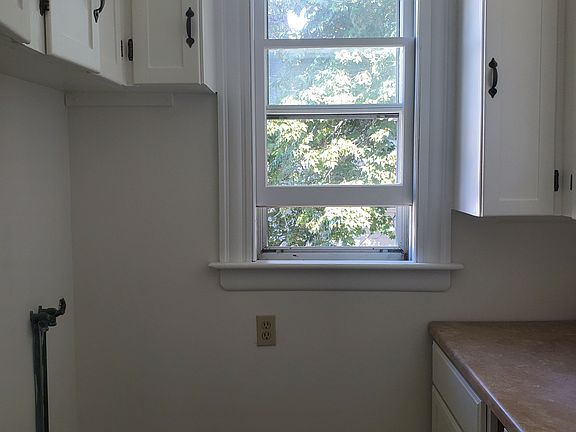 Pantry, cabinets on top and on bottom one side, new floor and freshly painted. Washer hook up